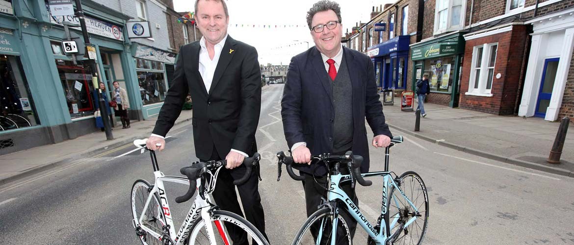 Bishy biking buddies: Gary Verity (left), from Welcome to Yorkshire and Johnny Hayes of Bishy Road Traders Association. Photograph: Kippa Matthews