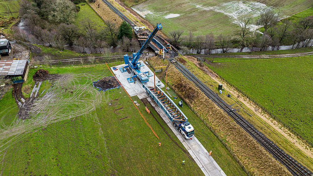 Watch: Amazing drone footage shows new railway bridge lowered into ...