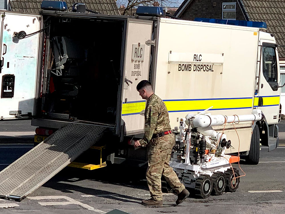Bomb squad called after grenade discovered in field