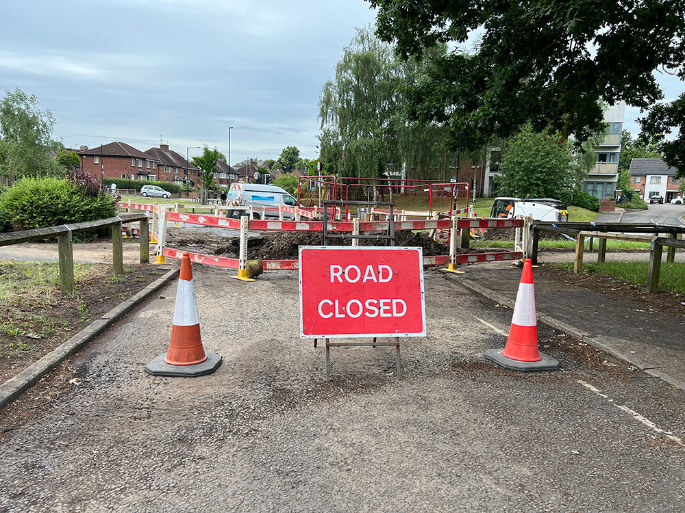 A big hole a school closed and a road shut Clear up begins after