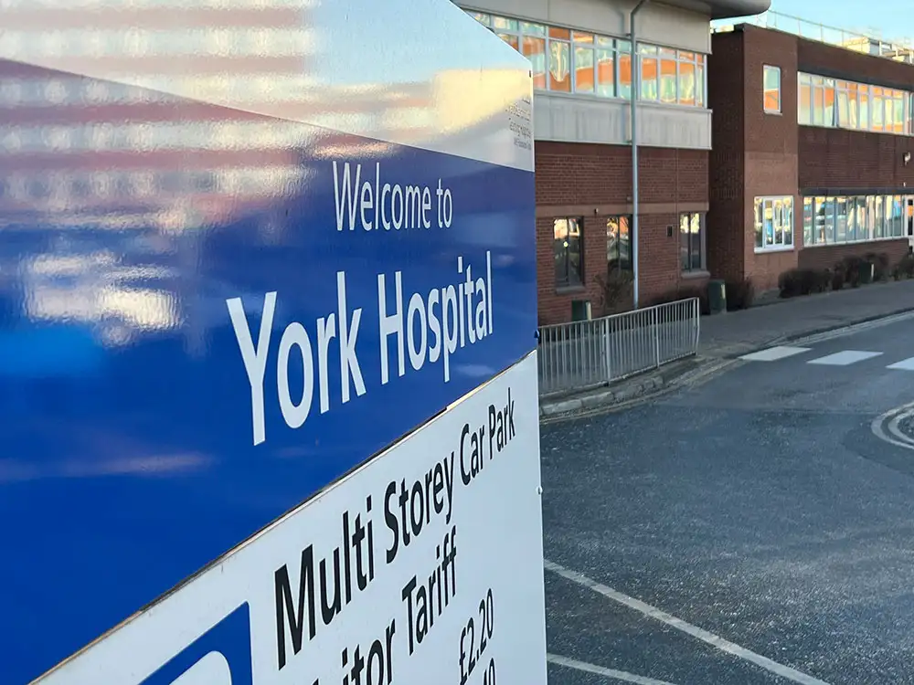 York Hospital Trust apologises for sign branding Indian food 'smelly