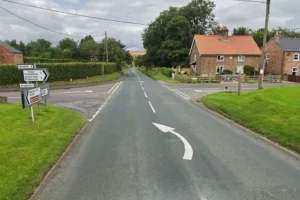Man, 82, dies in crash on village road