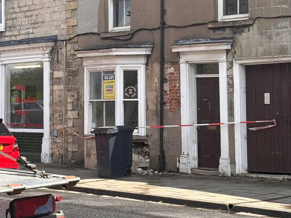 Updated: Car crashes into shop building in Tadcaster